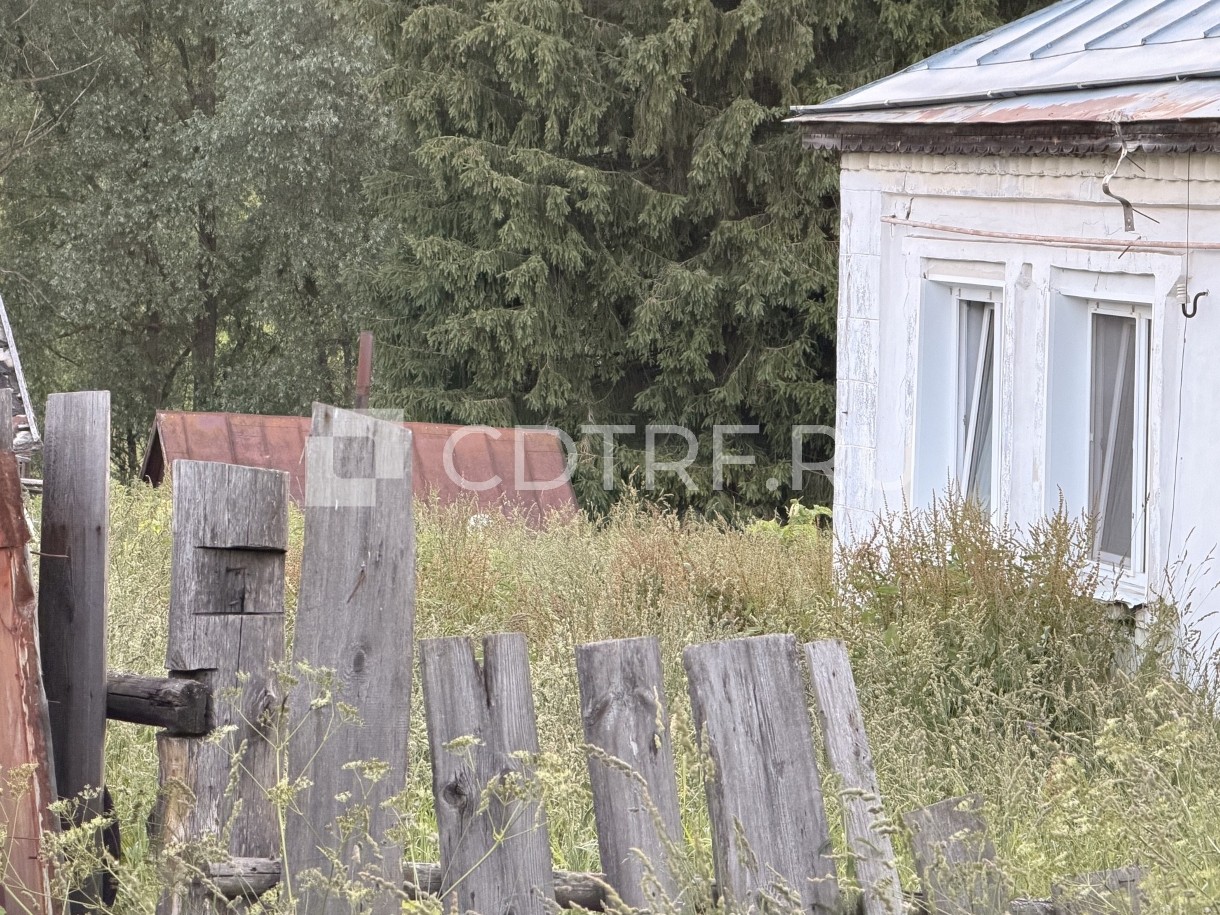 Жилой дом и земельный участок
