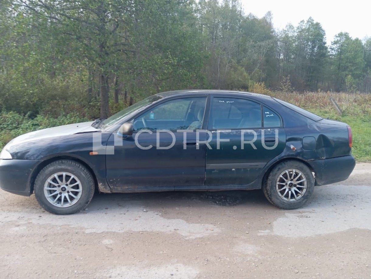 Транспортное средство Mitsubishi Carisma, 1995 г. выпуска , черного цвета, легковой...