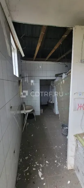Земельный участок и расположенное на нём нежилое здание