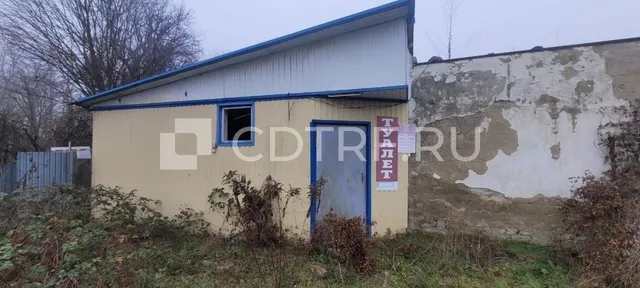 Земельный участок и расположенное на нём нежилое здание