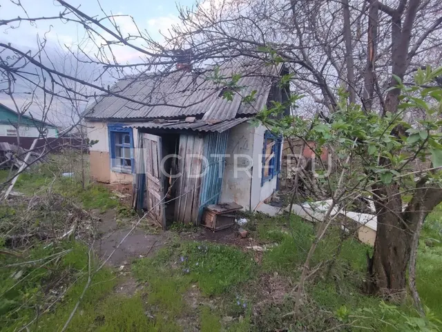 1/2 доля в жилом доме хоз.стр. зем. уч.: Ростовская обл гДонецк ул Богдана Хмельницкого 13