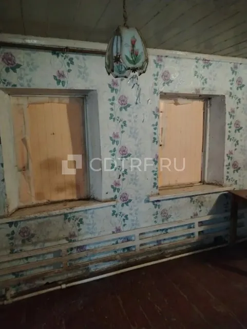 Жилой дом и земельный участок в Ростовской обл., Октябрьский р-н, сл. Красюковская