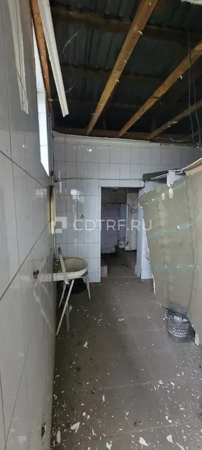 Земельный участок и расположенное на нём нежилое здание