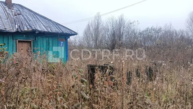 Жилой дом и земельный участок в Кемеровской области.