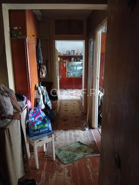 3/8 доли в квартире, площадь 59.1 кв.м, 5 этаж, кадастровый номер 71:30:020211:346.
