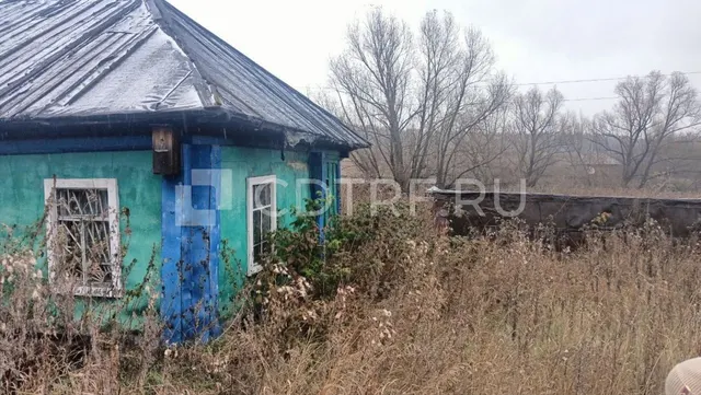 Жилой дом и земельный участок в Кемеровской области.