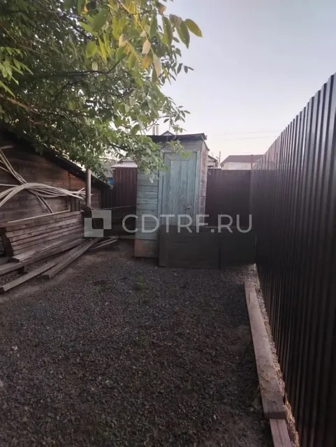 Жилой дом и земельный участок в Ростовской обл., Октябрьский р-н, сл. Красюковская