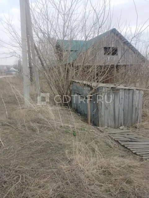 Жилое здание, площадь 21,4 кв.м.; Земельный участок, площадь 1376+/-130 кв.м.,
