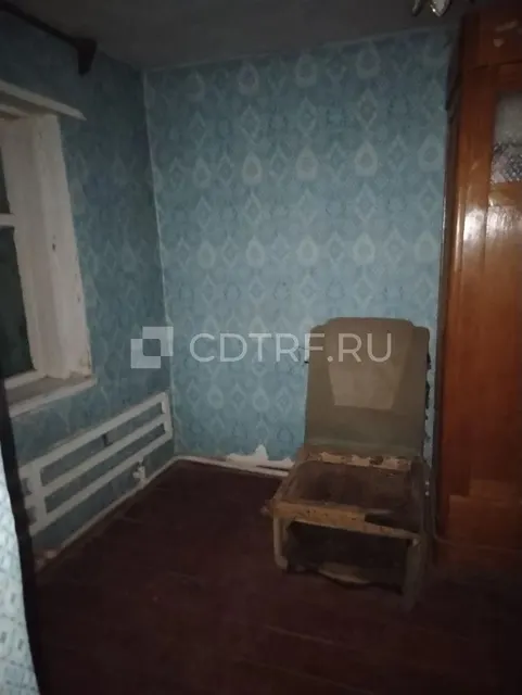 Жилой дом и земельный участок в Ростовской обл., Октябрьский р-н, сл. Красюковская