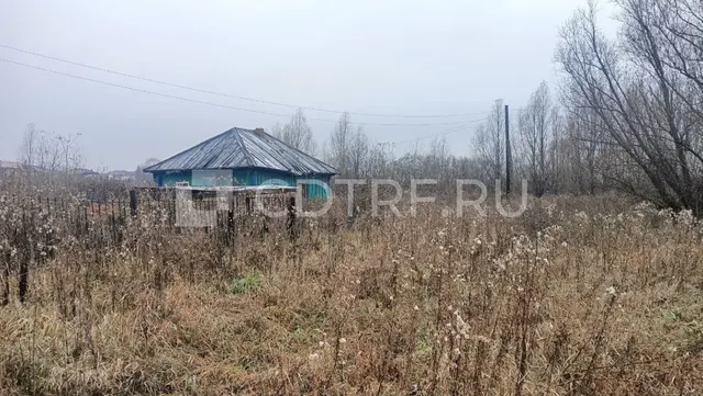 Жилой дом и земельный участок в Кемеровской области.
