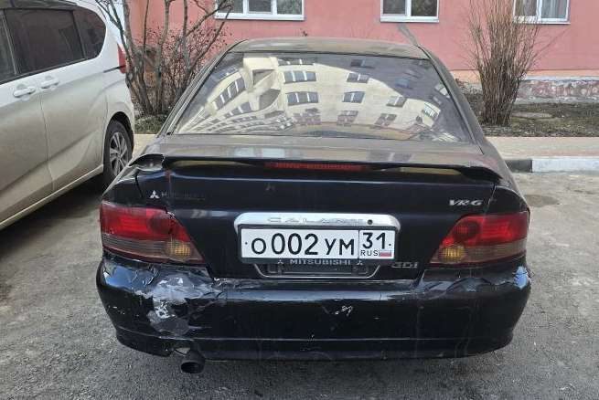 Автомобиль Mitsubishi Galant (год выпуска 1999, Кузов № EA3A0300423, цвет черный, г.р.з. О002УМ31).