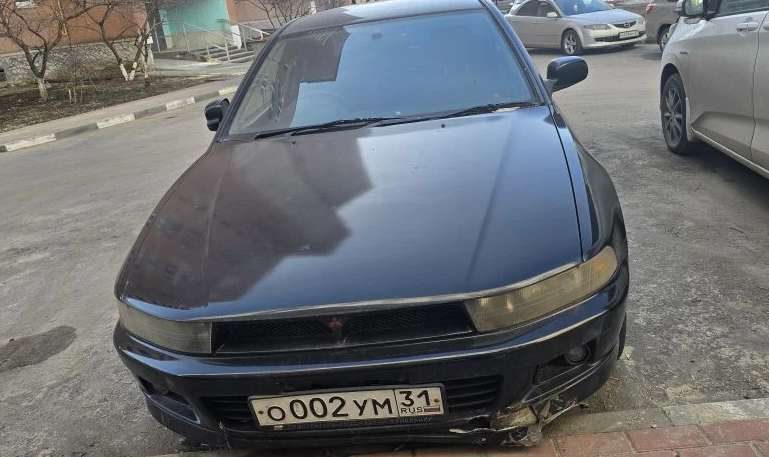 Автомобиль Mitsubishi Galant (год выпуска 1999, Кузов № EA3A0300423, цвет черный, г.р.з. О002УМ31).