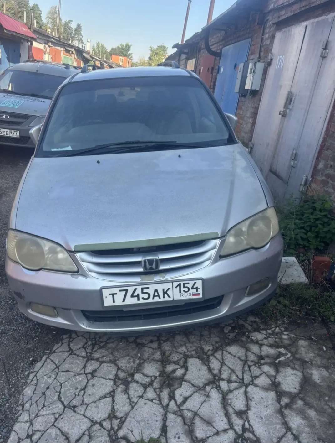 Автомобиль ХОНДА ОДИССЕЙ, 2000 года выпуска, цвет серый, 150 л.с. (110,3 кВТт), кузов RA61017031, VIN отсутствует. Модель, № двигателя F23A 2313076. Государственный регистрационный знак Т745АК154, свидетельство о регистрации 99 72 022621. Автомобиль находится в г. Видное, Московская область.