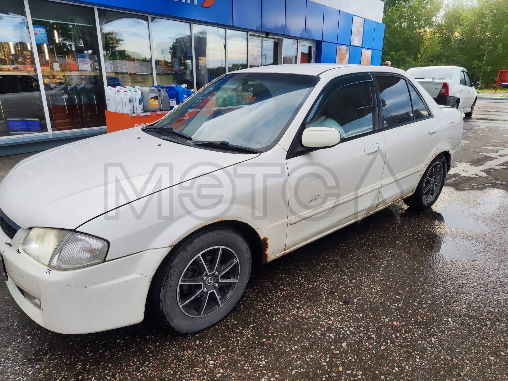 Mazda Familia, 1999 года, 110 лс