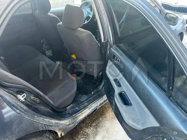 Mitsubishi Lancer, 2004 года, 98 лс, 495000 км