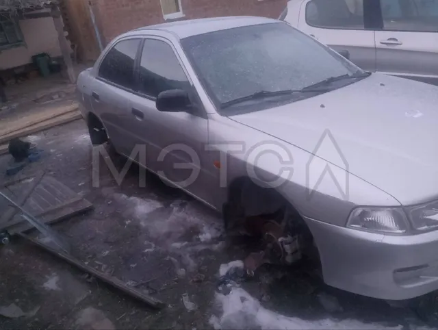 Mitsubishi Lancer, 2000 года, 75 лс