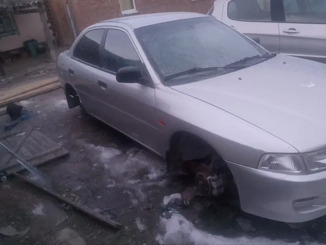 Mitsubishi Lancer, 2000 года, 75 лс