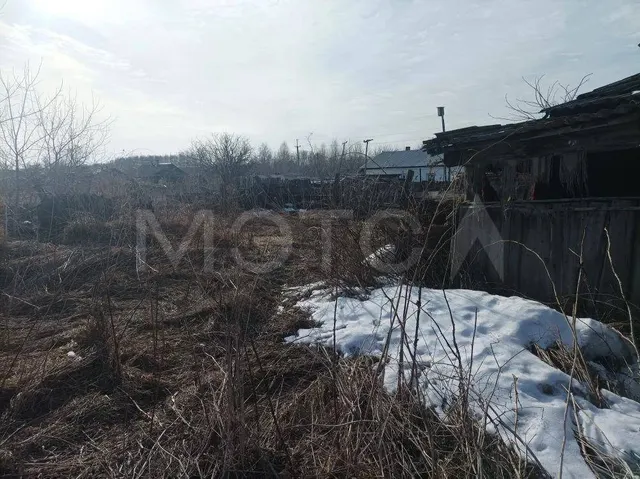 Земельный участок в Кемеровской обл., 1400 кв.м.