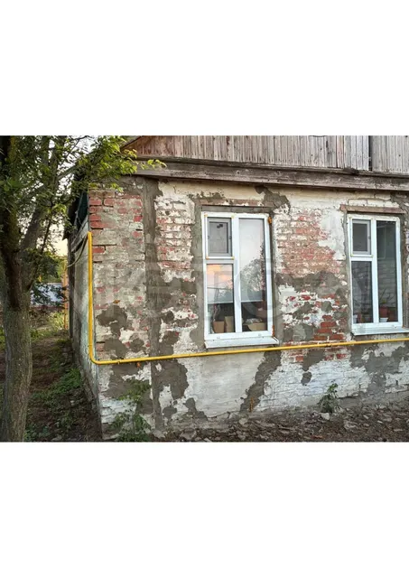 1/2 доля дома и 1/2 доля земельного участка в Ростовской обл.