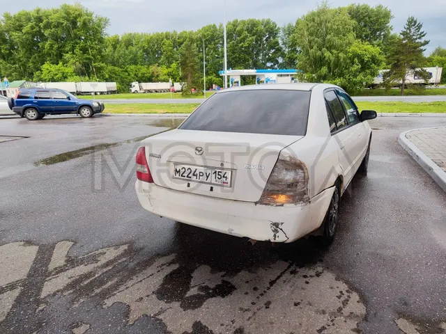 Mazda Familia, 1999 года, 110 лс