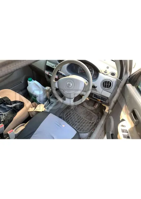 Nissan Pino, 2009 года, 54 лс, АКПП