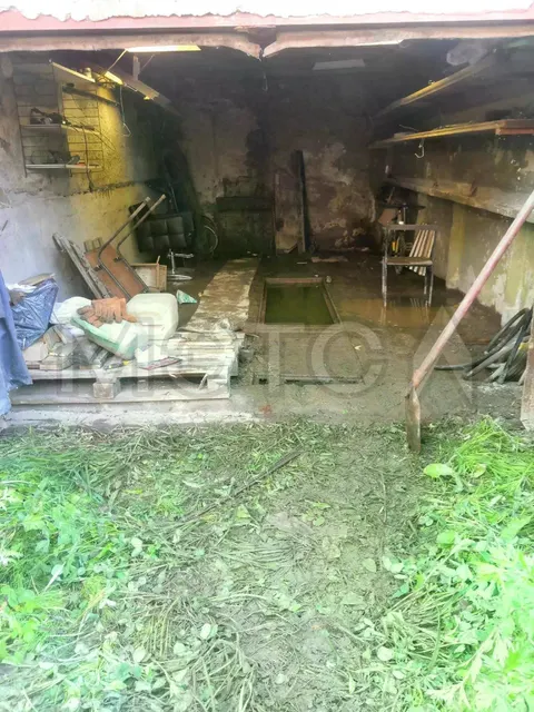 Гараж 19,2 кв.м. и земельный участок 35+/-1.24 кв.м. в Ленинградской обл.