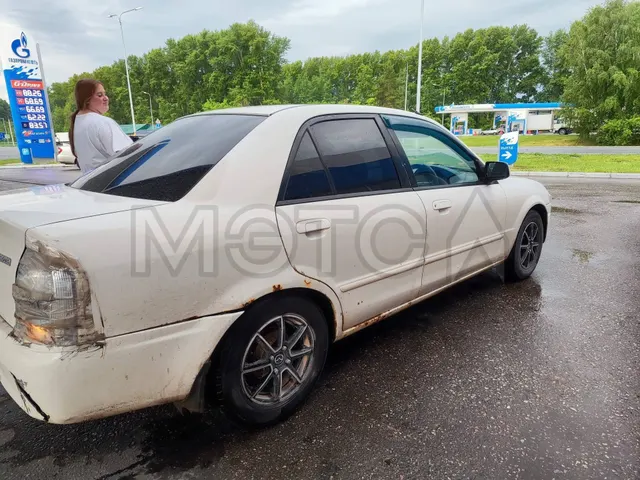 Mazda Familia, 1999 года, 110 лс