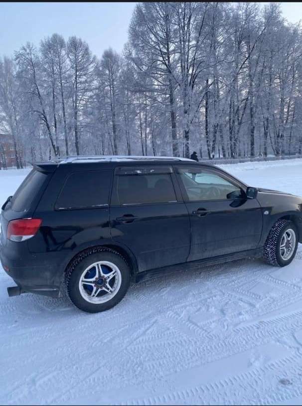 автомобиль марка – MITSUBISHI. Модель – AIRTREK, год изготовления – 2002, номер кузова - CU2W0011761 .