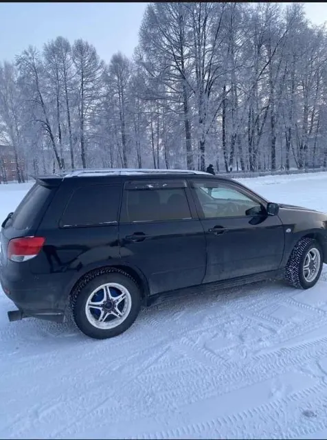 автомобиль марка – MITSUBISHI. Модель – AIRTREK, год изготовления – 2002, номер кузова - CU2W0011761 .