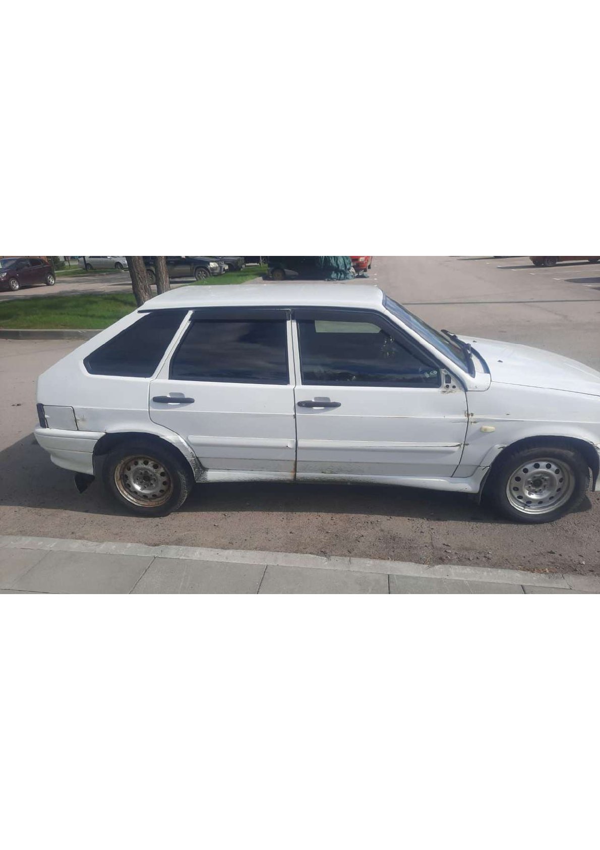 Автомобиль марки ВАЗ модель 211440 2013 г.в. VIN-номер XTA211440E523733