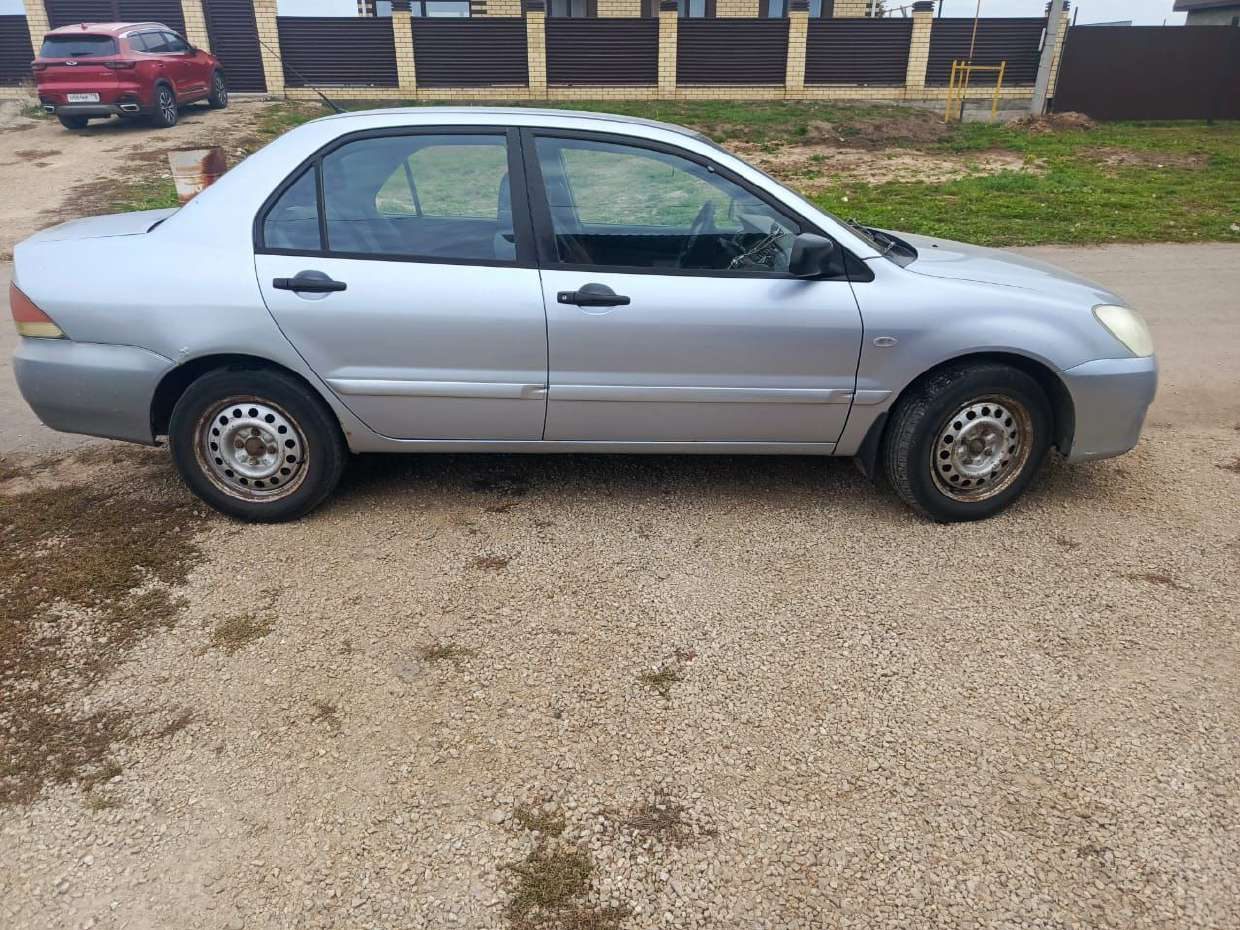 Автомобиль марки MITSUBISHI модель (JMB) LANCER 1.3 2005 г.в. VIN-номер JMBSNCS1A5U002556