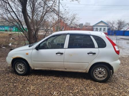 автомобиль легковой комби (хэтчбек) Lada 111930 Lada Kalina, 2012 года выпуска, VIN ХТА111930C0203617, цвет : белый, государственный регистрационный знак В647РМ164.