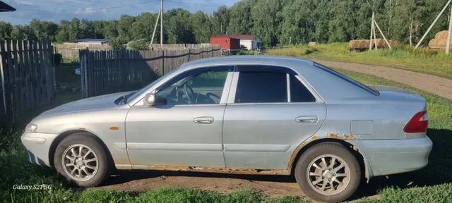 Автомобиль марки MAZDA модель КАПЕЛЛА 2001 г.в. номер кузова GF8P 205049