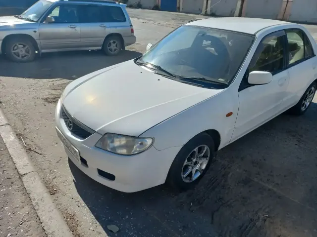 Автомобиль марки MAZDA модель FAMILIA 2001 г.в. номер кузова BJ5P306709