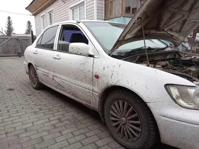 Автомобиль марки MITSUBISHI модель Lancer 2002 г.в. номер кузова CS2A0406937 (является предметом залога)