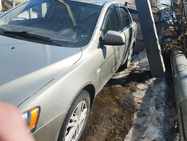 автомобиль марки MITSUBISHI модель Lancer 2011 г.в. VIN- номер JMBSNCY2ABU007750