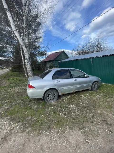 автомобиль марки MITSUBISHI модель Lancer 2004 г.в. VIN-номер JMBSNCS3A4U006721