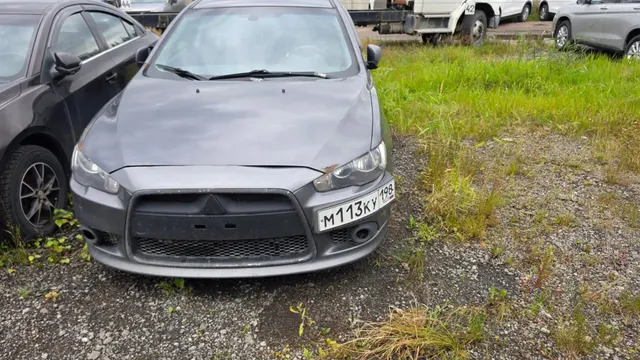 Автомобиль марки MITSUBISHI модель Lancer 2011 г.в. VIN-номер JMBSTCY3ABU001025