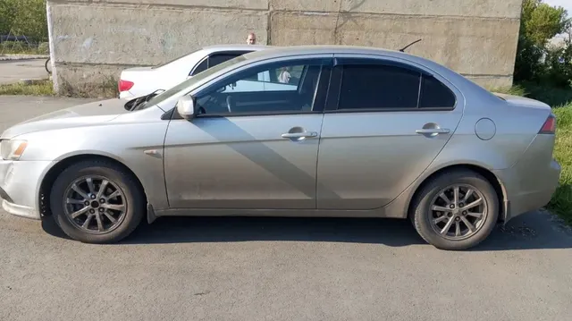 Автомобиль марки MITSUBISHI модель Lancer 2012 г.в. VIN-номер JMBSRCY1ACU004891