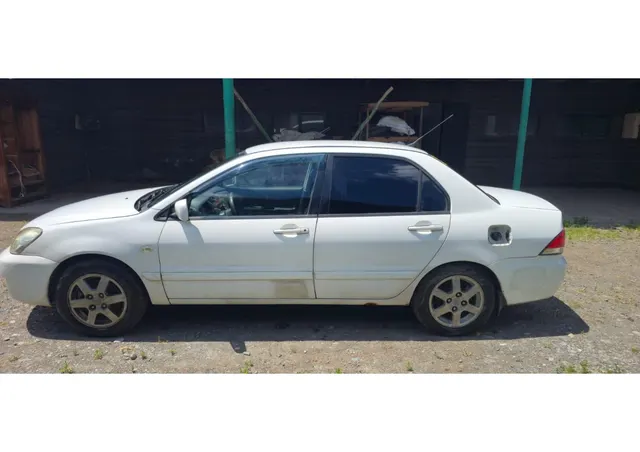 Автомобиль марки MITSUBISHI модель Lancer 2006 г.в. VIN-номер JMBSNCS3A7U009559