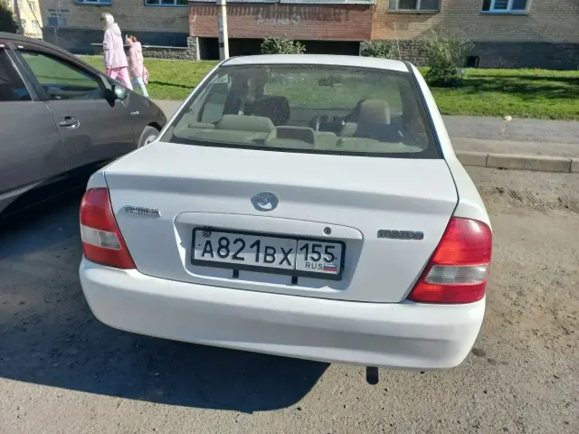 Автомобиль марки MAZDA модель FAMILIA 2001 г.в. номер кузова BJ5P306709