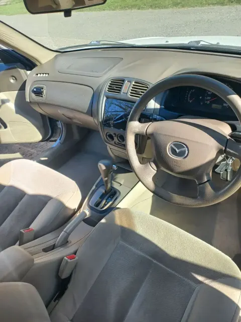 Автомобиль марки MAZDA модель FAMILIA 2001 г.в. номер кузова BJ5P306709