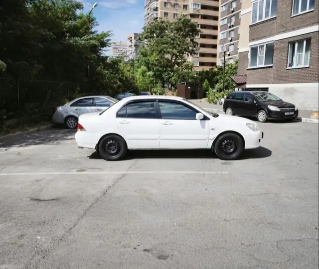 MITSUBISHI LANCER 1.6, 2005 г. выпуска, цвет белый, VIN: JMBSNCS3A5U017157