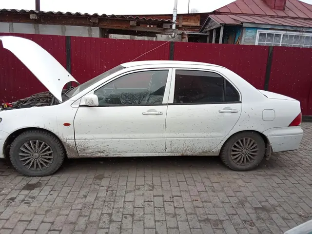 Автомобиль марки MITSUBISHI модель Lancer 2002 г.в. номер кузова CS2A0406937 (является предметом залога)