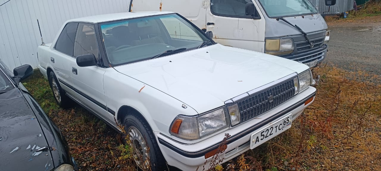 Автомобиль марки “Toyota Crown”, Государственный номер А 522 ТС 65