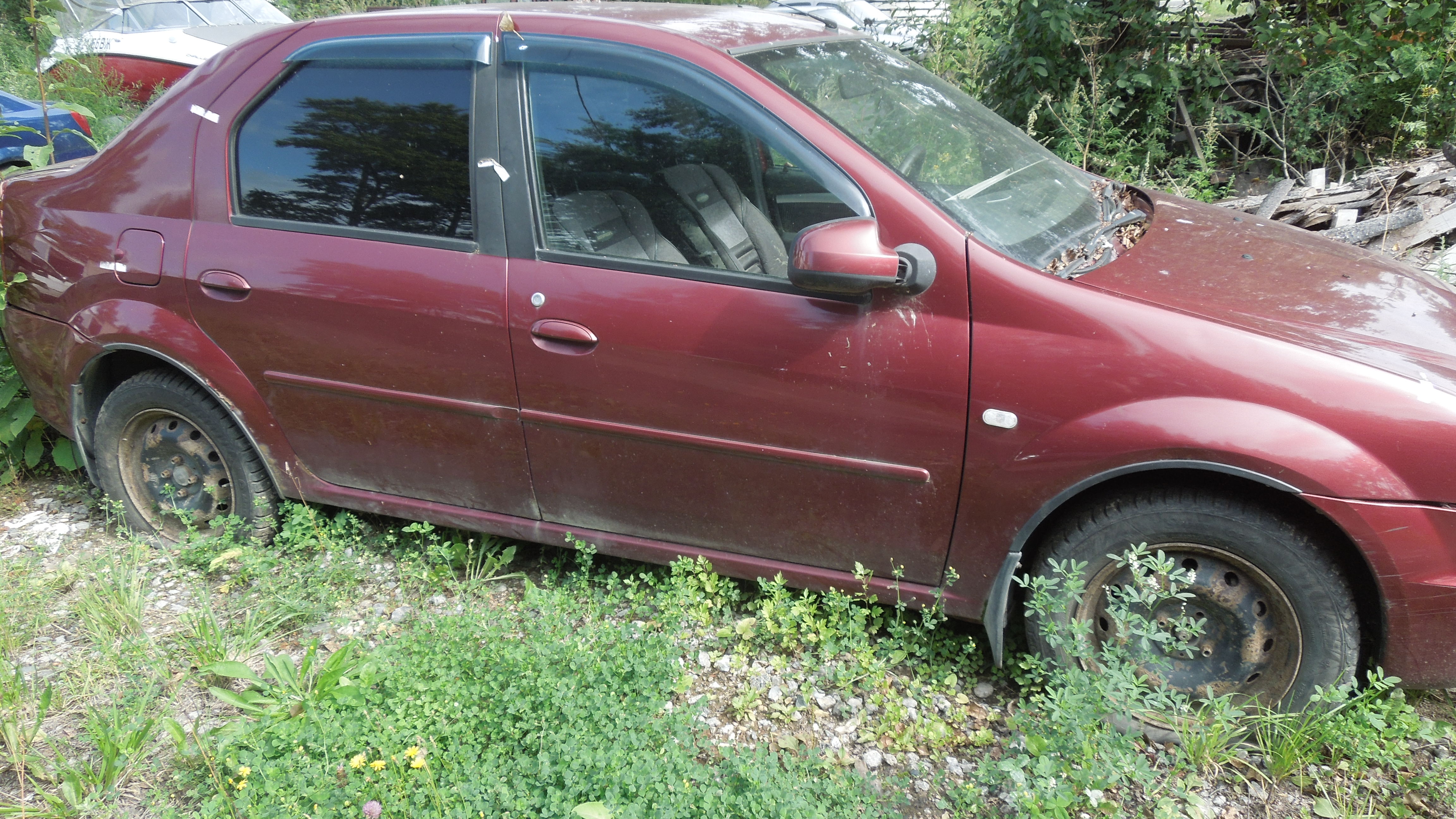 Автомобиль марки Рено Логан грз К 360 УВ 35 (отсутствует) VIN X7LLSRBYHCH487793 цвет красный гв 2012.