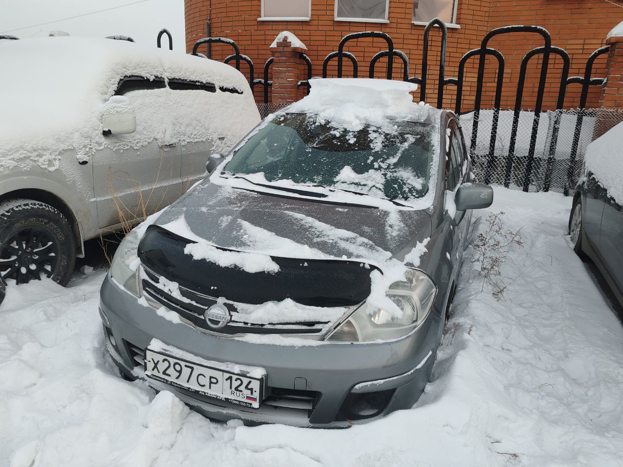 Легковой автомобиль седан NISSAN Tiida, 2013г.в., г/н X297CP124, VIN 3N1BCAC11UK582846, номер кузова 3N1BCAC11UK582846, номер двигателя 359516C, цвет серый. Начальная цена продажи 857 000 руб. Задаток 128600 руб
