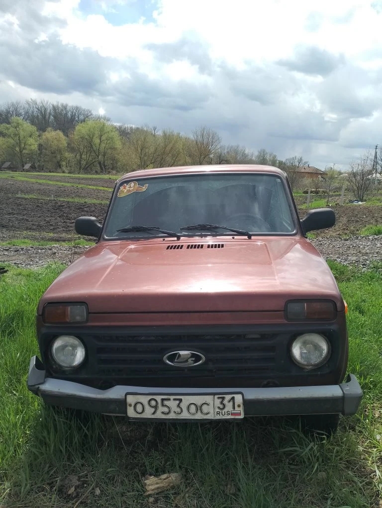 Автомобиль LADA Нива 212140, 2018 года выпуска, регистрационный знак О953ОС31, цвет коричневый идентификационный номер (VIN) ХТА212140J2320729