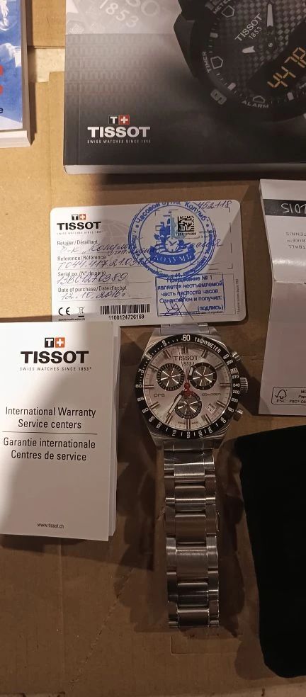 Наручные часы марки "Tissot" модели "PRS 516", имеющие идентификационный номер (артикул): "T044417A" и серийный номер: "13BC1270389, фирменную коробку завода - изготовителя с документами на часы и паспортом на них