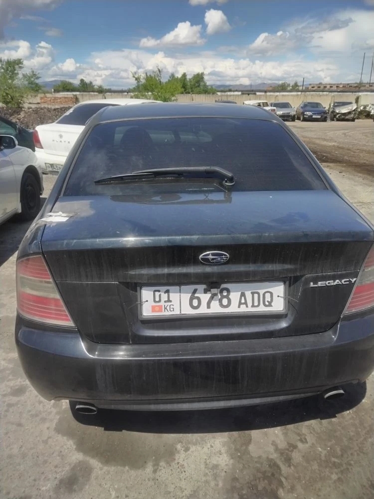 Транспортное средство марки «Subaru Legacy», 2005 года выпуска, номер кузова «BL5-039204», регистрационный номерной знак 01 KG678ADQ . (годные остатки) (задержанное)